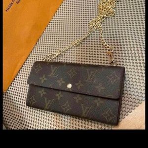 Authentic Louis Vuitton wallet/crossbody .